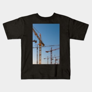 Cranes against clear blue sky Kids T-Shirt